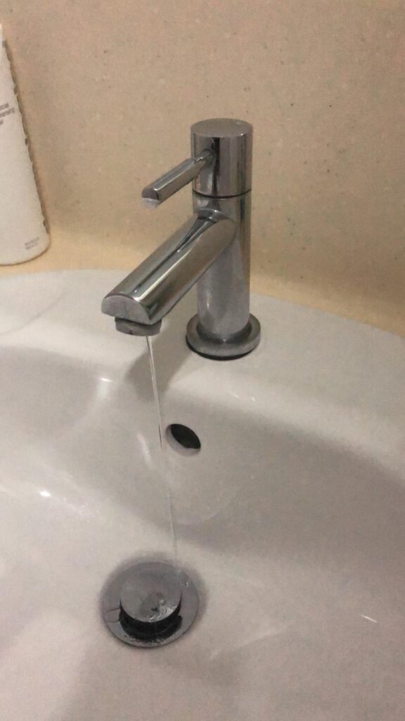 basin-faucet-leaking-from-spout-when-fully-turned-off