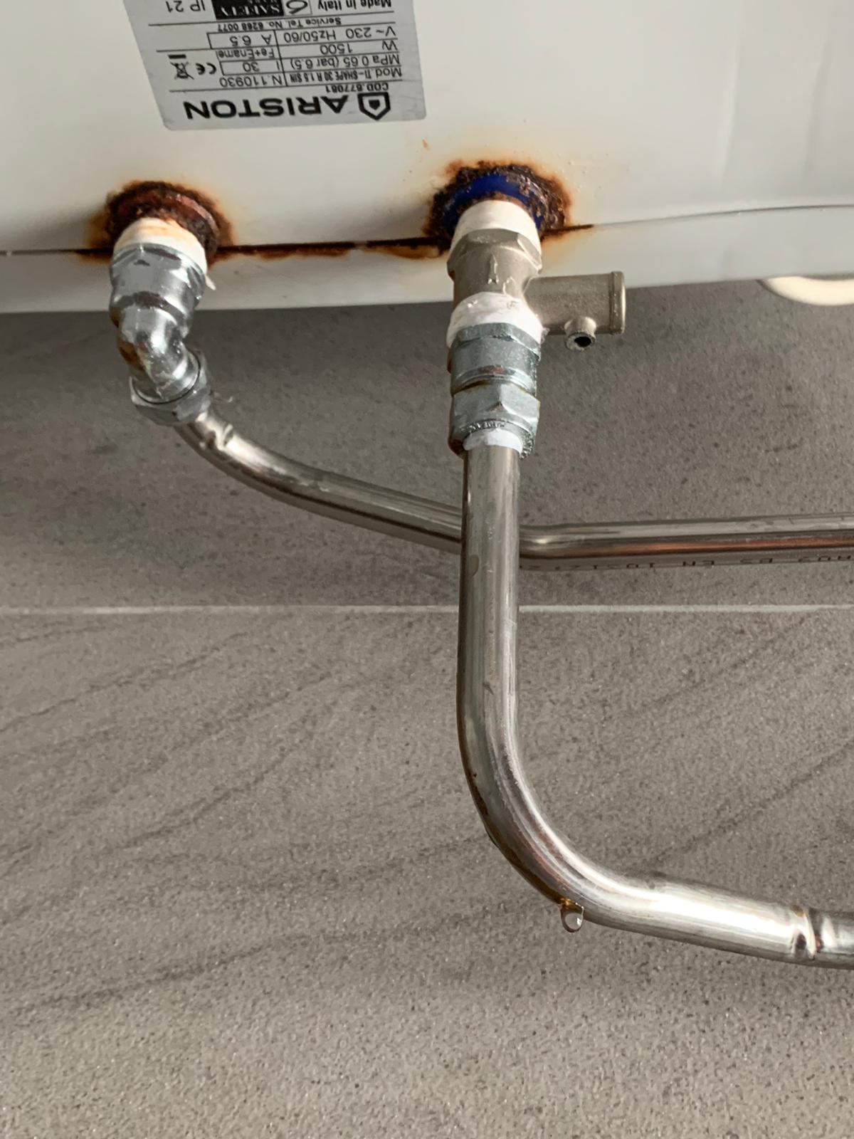 rusty-water-leaking-from-instant-water-heater