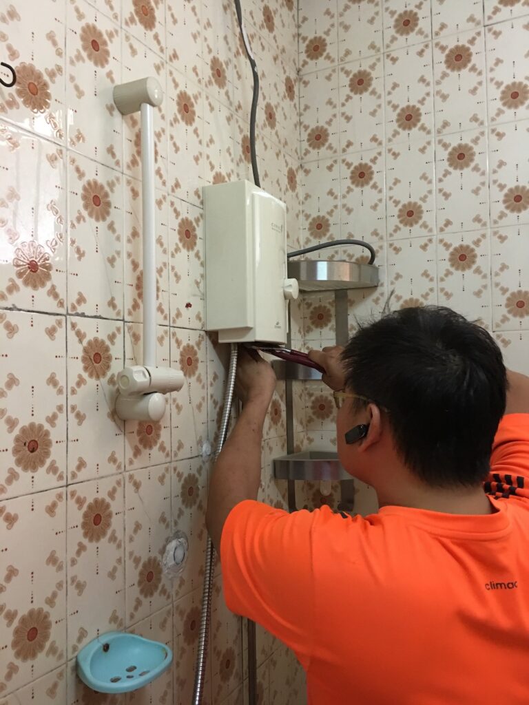 electrician-repair-instant-water-heater