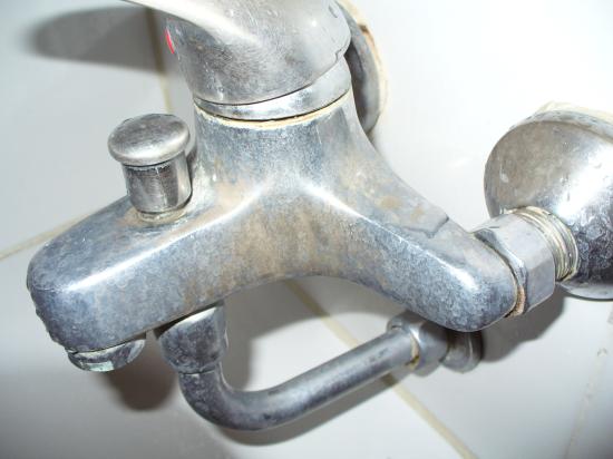 hard-water-deposit-on-shower-mixer